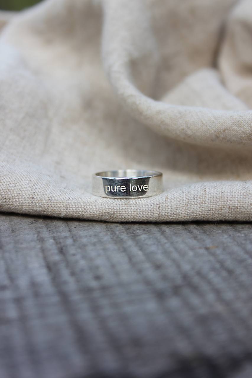 ring with engraving
“PURE LOVE”