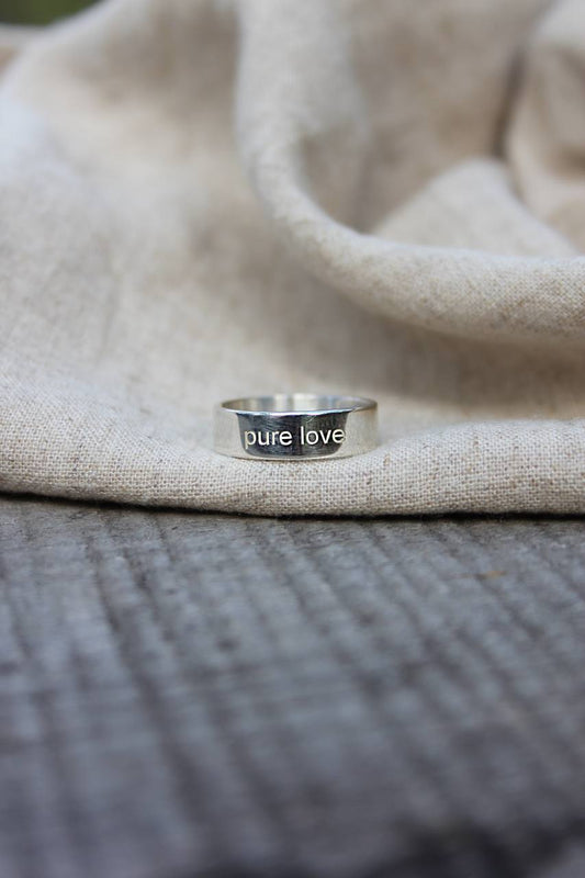 ring with engraving
“PURE LOVE”